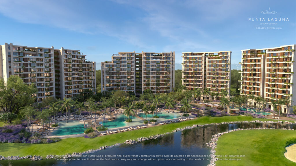 vista área panorámica de un conjunto residencial de lujo en playa del carmen con una alberca y laguna de vista 